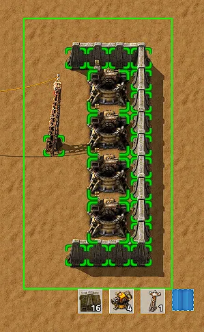 A blueprint selection outlined around a row of identical production buildings and a power pole — the repeatable unit that gets stamped down again
