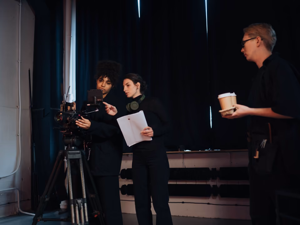 A director reviewing footage on a monitor
