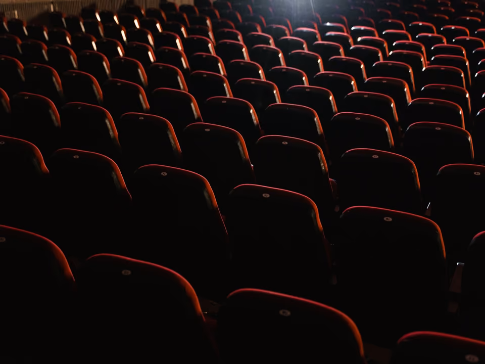 Empty seats in a darkened cinema
