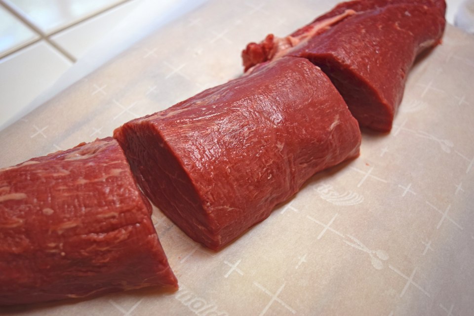 Raw beef tenderloin cut into portions, a resting cut with fine, even muscle grain and almost no connective tissue