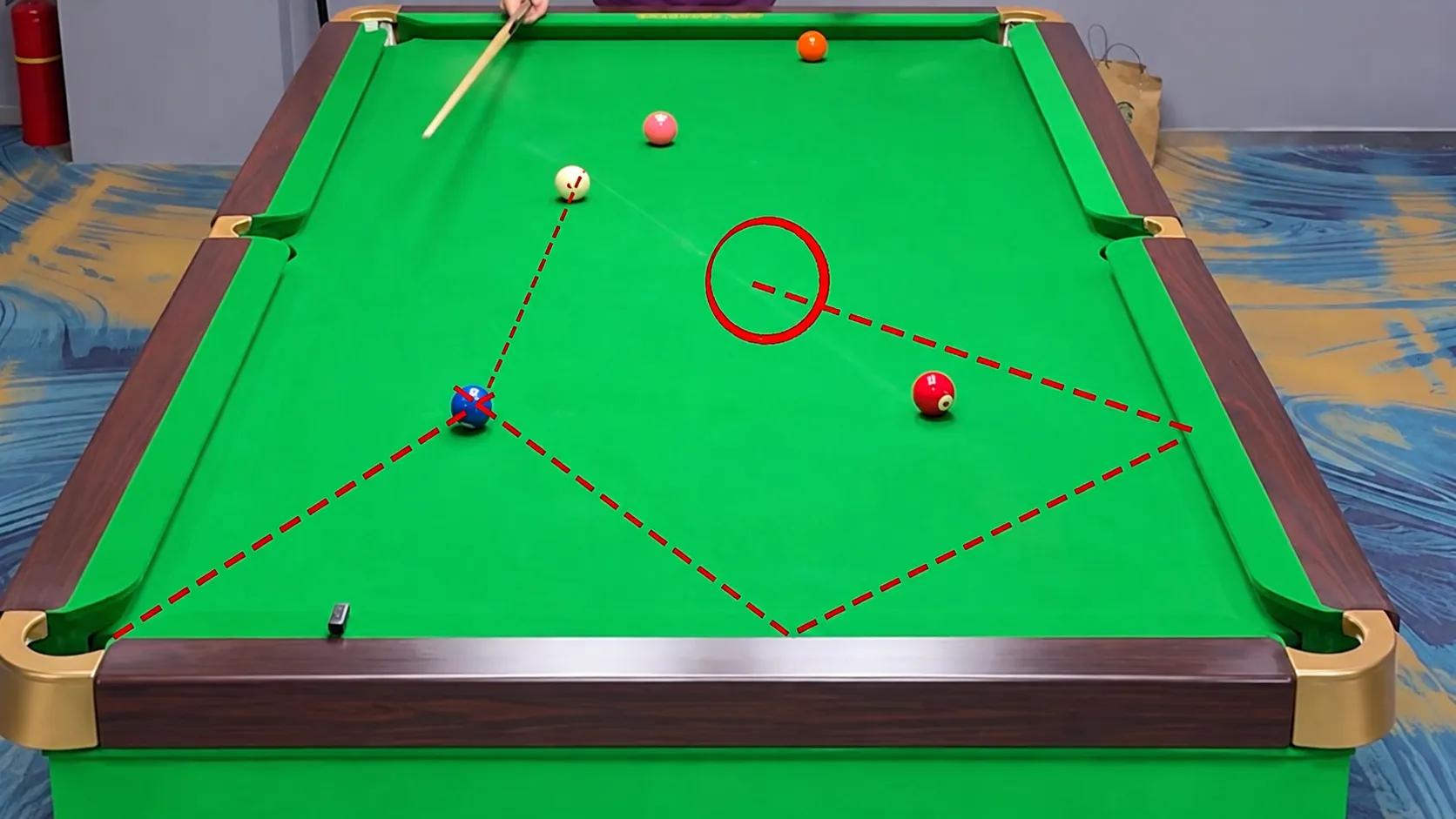 Worked example: a multi-rail cue-ball route on a real table, using high-middle right English to reach position.