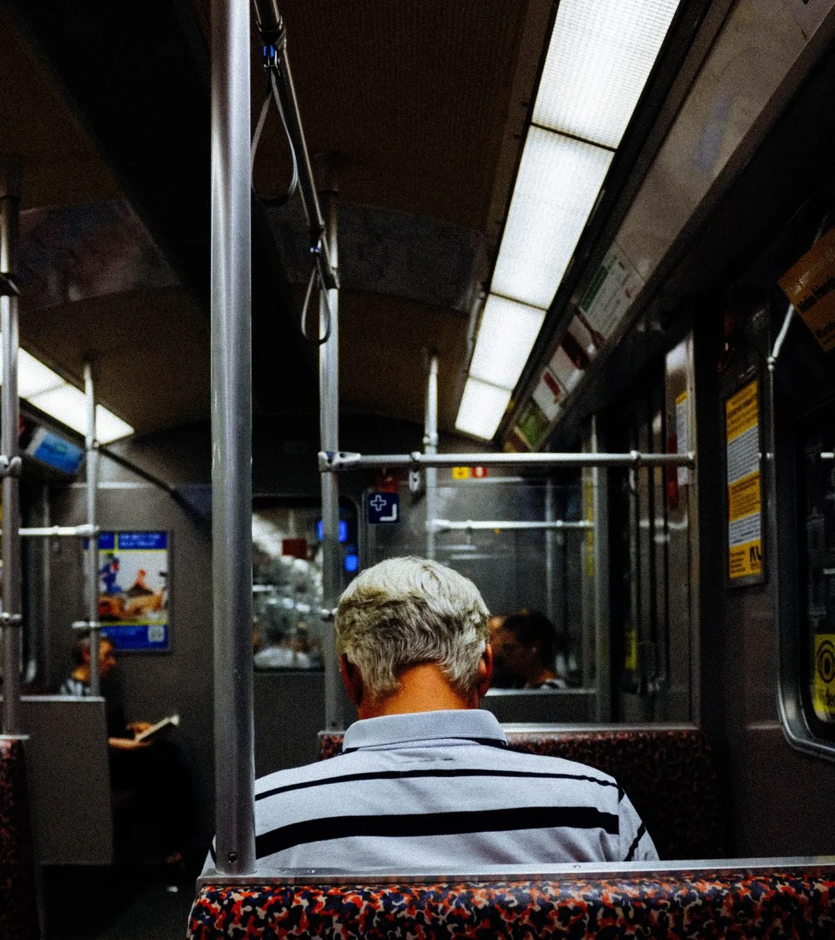 Good manner: one passenger, seated normally, one seat — nothing else
spread across it.